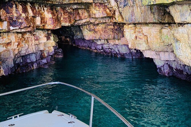 Boat tour of the Polignano a Mare caves with aperitif - Quick Hits Before You Board