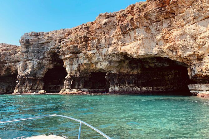 Boat tour of the Polignano a Mare caves with aperitif - Grotta Azzurra: Light, Shadows, and That Blue Effect