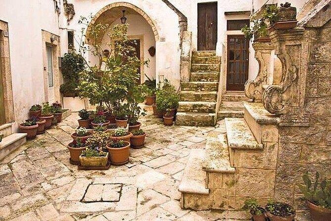 Full-day tour Alberobello & Locorotondo & Polignano a Mare & Bari - Alberobello’s trulli (UNESCO) plus a 1700 trullo tasting