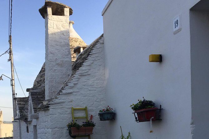 The Best of Polignano a Mare Walking Tour and Special Coffee Tasting - Polignano’s cliffs, caves, and inlets: the terrain becomes the guide