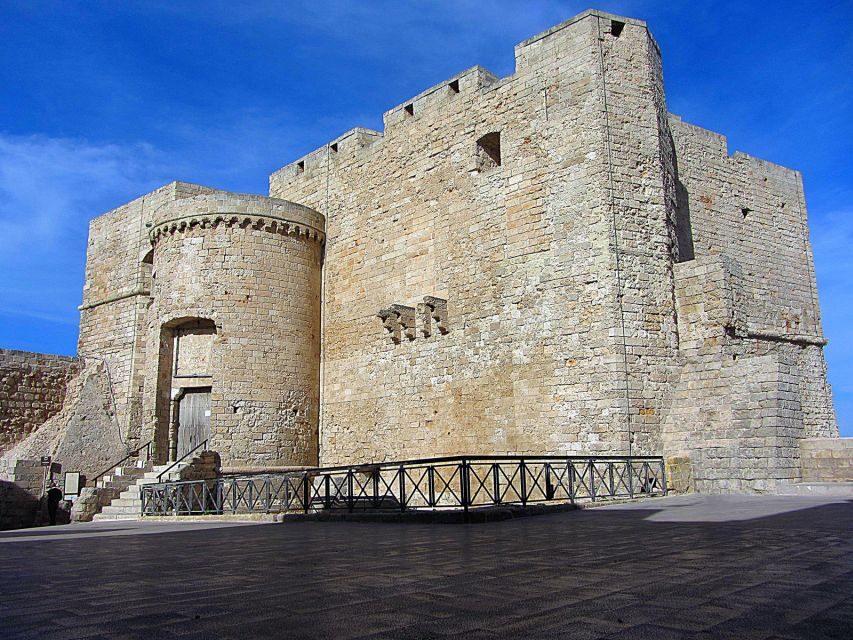 Walking Tour In The Wonderful Monopoli - The old-town streets around the sights: arches, spires, and stone walls